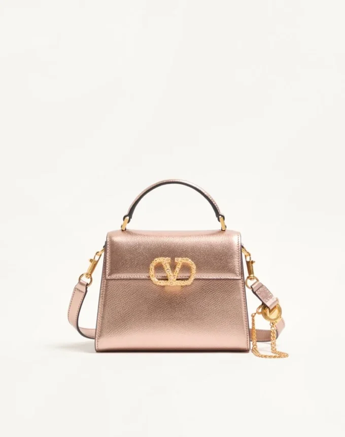 Bolso mini Vsling de Valentino Garavani en piel de becerro granulada laminada con logotipo joya Bolso mini Vsling de Valentino Garavani en piel de becerro granulada laminada con logotipo joya