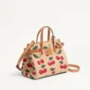 Bolso pequeño Antibes de Valentino Garavani en rafia jacquard con estampado Cherryfic Bolso pequeño Antibes de Valentino Garavani en rafia jacquard con estampado Cherryfic