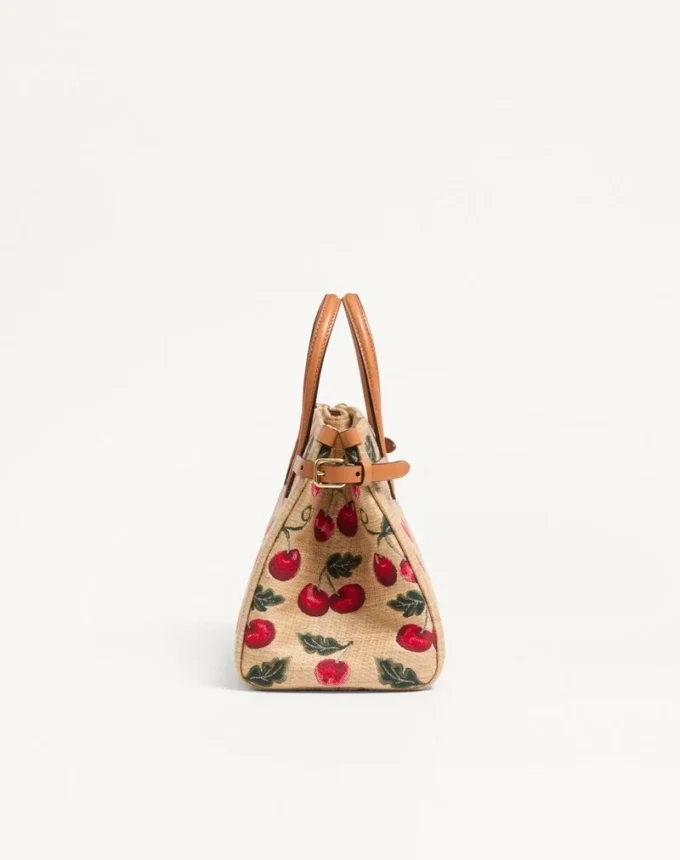 Bolso pequeño Antibes de Valentino Garavani en rafia jacquard con estampado Cherryfic Bolso pequeño Antibes de Valentino Garavani en rafia jacquard con estampado Cherryfic