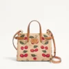 Bolso pequeño Antibes de Valentino Garavani en rafia jacquard con estampado Cherryfic Bolso pequeño Antibes de Valentino Garavani en rafia jacquard con estampado Cherryfic