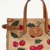 Bolso pequeño Antibes de Valentino Garavani en rafia jacquard con estampado Cherryfic Bolso pequeño Antibes de Valentino Garavani en rafia jacquard con estampado Cherryfic