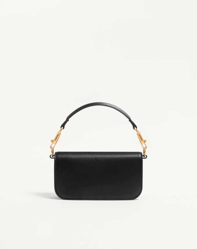 Bolso pequeño de hombro Locò de Valentino Garavani en piel de becerro Bolso pequeño de hombro Locò de Valentino Garavani en piel de becerro