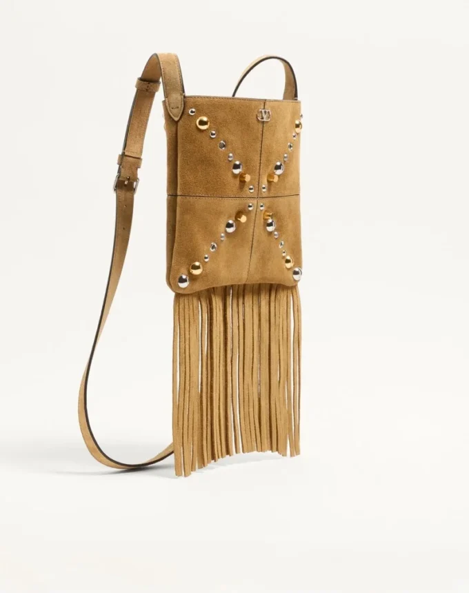 Bolso pequeño de hombro Nellcôte de Valentino Garavani en ante con flecos Bolso pequeño de hombro Nellcôte de Valentino Garavani en ante con flecos