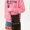 Bolso pequeño de hombro Nellcôte de Valentino Garavani en ante con flecos Bolso pequeño de hombro Nellcôte de Valentino Garavani en ante con flecos