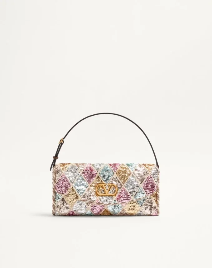 Bolso pequeño de hombro Valentino Garavani DeVain con bordado Rhombelle. Bolso pequeño de hombro Valentino Garavani DeVain con bordado Rhombelle.