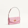 Bolso pequeño de hombro Valentino Garavani DeVain en tejido jacquard cloqué. Bolso pequeño de hombro Valentino Garavani DeVain en tejido jacquard cloqué.