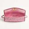 Bolso pequeño de hombro Valentino Garavani DeVain en tejido jacquard cloqué. Bolso pequeño de hombro Valentino Garavani DeVain en tejido jacquard cloqué.