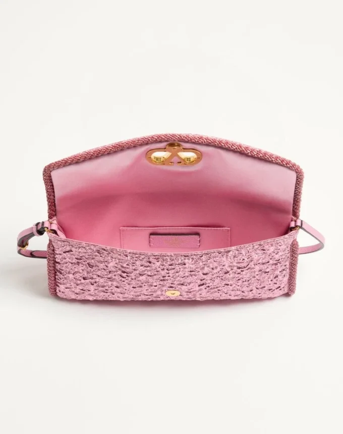 Bolso pequeño de hombro Valentino Garavani DeVain en tejido jacquard cloqué. Bolso pequeño de hombro Valentino Garavani DeVain en tejido jacquard cloqué.