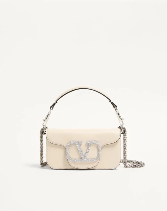 Bolso pequeño de hombro Valentino Garavani Locò con logotipo joya Bolso pequeño de hombro Valentino Garavani Locò con logotipo joya