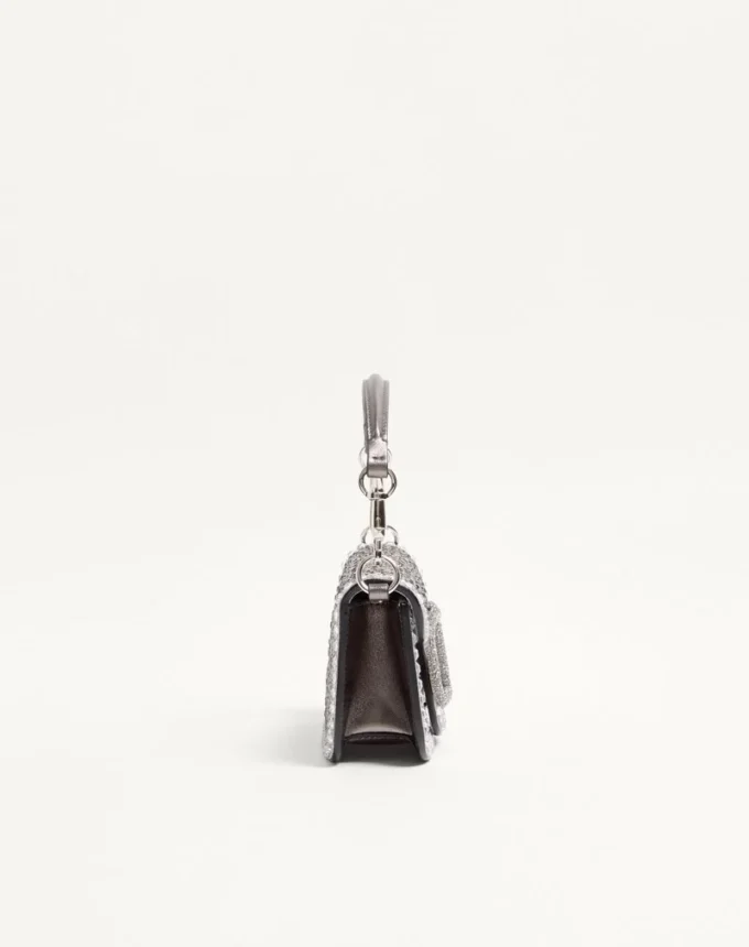 Bolso pequeño de hombro Valentino Garavani Locò con pedrería Bolso pequeño de hombro Valentino Garavani Locò con pedrería
