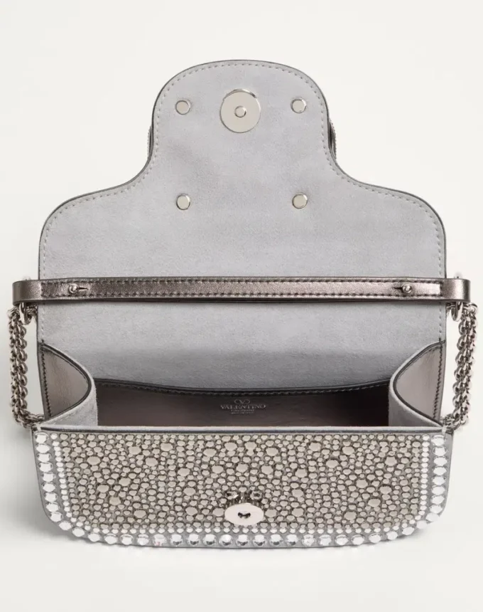 Bolso pequeño de hombro Valentino Garavani Locò con pedrería Bolso pequeño de hombro Valentino Garavani Locò con pedrería