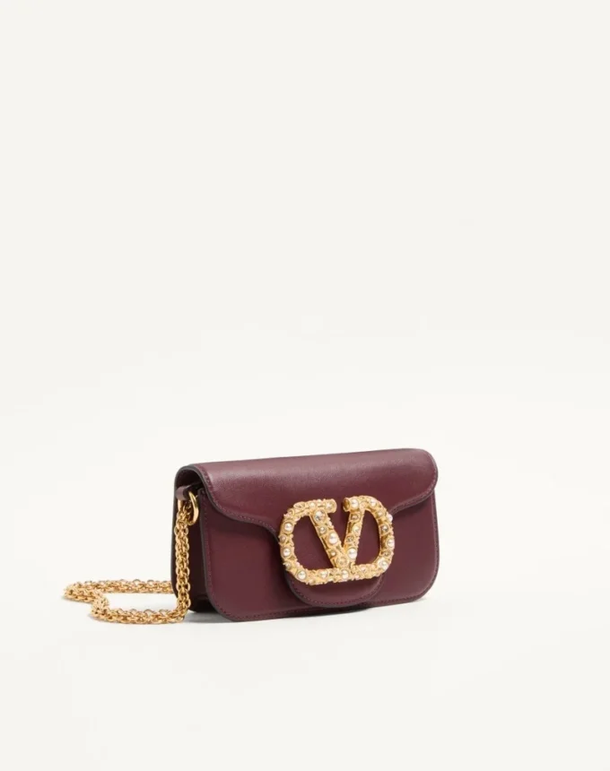 Bolso pequeño de hombro Valentino Garavani Locò en piel de becerro con logotipo Jewel