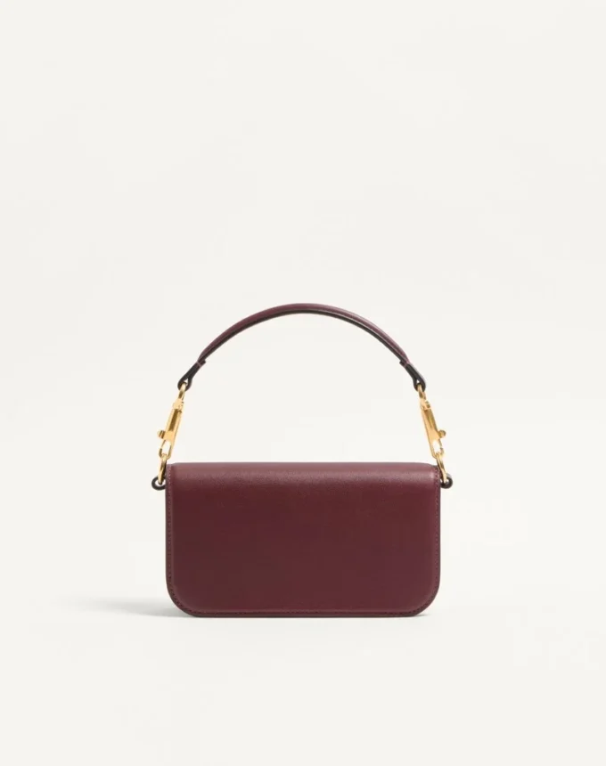 Bolso pequeño de hombro Valentino Garavani Locò en piel de becerro con logotipo Jewel