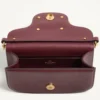 Bolso pequeño de hombro Valentino Garavani Locò en piel de becerro con logotipo Jewel