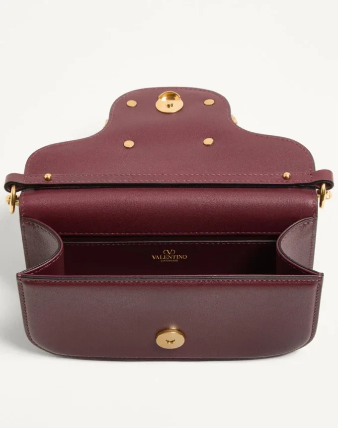 Bolso pequeño de hombro Valentino Garavani Locò en piel de becerro con logotipo Jewel
