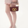 Bolso pequeño de hombro Valentino Garavani Locò en piel de becerro con logotipo Jewel