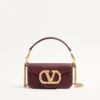 Bolso pequeño de hombro Valentino Garavani Locò en piel de becerro con logotipo Jewel