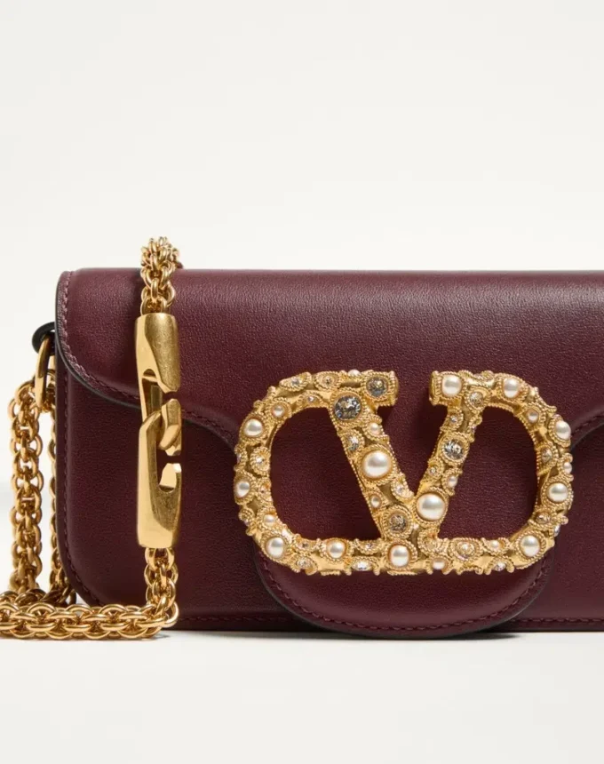 Bolso pequeño de hombro Valentino Garavani Locò en piel de becerro con logotipo Jewel