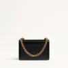 Bolso pequeño de hombro Valentino Garavani Vain en piel de becerro brillante Bolso pequeño de hombro Valentino Garavani Vain en piel de becerro brillante