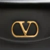 Bolso pequeño de hombro Valentino Garavani Vain en piel de becerro brillante Bolso pequeño de hombro Valentino Garavani Vain en piel de becerro brillante
