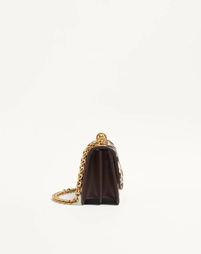 Bolso pequeño de hombro Valentino Garavani Vain en piel de becerro con efecto poni y estampado animalier Bolso pequeño de hombro Valentino Garavani Vain en piel de becerro con efecto poni y estampado animalier