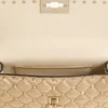 Bolso pequeño de napa laminada con tachuelas Rockstud de Valentino Garavani Bolso pequeño de napa laminada con tachuelas Rockstud de Valentino Garavani