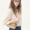 Bolso pequeño de napa laminada con tachuelas Rockstud de Valentino Garavani Bolso pequeño de napa laminada con tachuelas Rockstud de Valentino Garavani