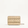 Bolso pequeño de napa laminada con tachuelas Rockstud de Valentino Garavani Bolso pequeño de napa laminada con tachuelas Rockstud de Valentino Garavani