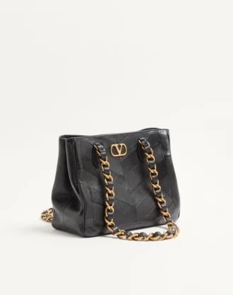 Bolso pequeño Laseine de Valentino Garavani en piel napa con estampado en forma de chevron