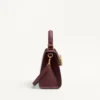 Bolso pequeño Valentino Garavani Vsling en piel de becerro granulada con logotipo joya