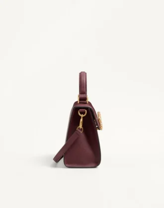 Bolso pequeño Valentino Garavani Vsling en piel de becerro granulada con logotipo joya