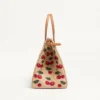 Bolso shopping mediano Antibes de Valentino Garavani en rafia jacquard con motivo Cherryfic Bolso shopping mediano Antibes de Valentino Garavani en rafia jacquard con motivo Cherryfic