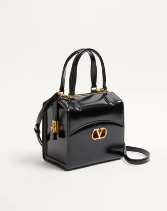 Bolso tipo bowling Vain-Case de Valentino Garavani en piel de becerro brillante