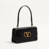 Bolso Valentino Garavani Vain con asa en piel de becerro brillante Bolso Valentino Garavani Vain con asa en piel de becerro brillante
