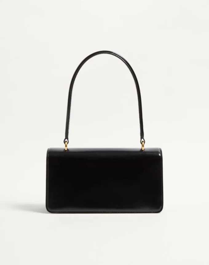 Bolso Valentino Garavani Vain con asa en piel de becerro brillante Bolso Valentino Garavani Vain con asa en piel de becerro brillante