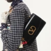 Bolso Valentino Garavani Vain con asa en piel de becerro brillante Bolso Valentino Garavani Vain con asa en piel de becerro brillante