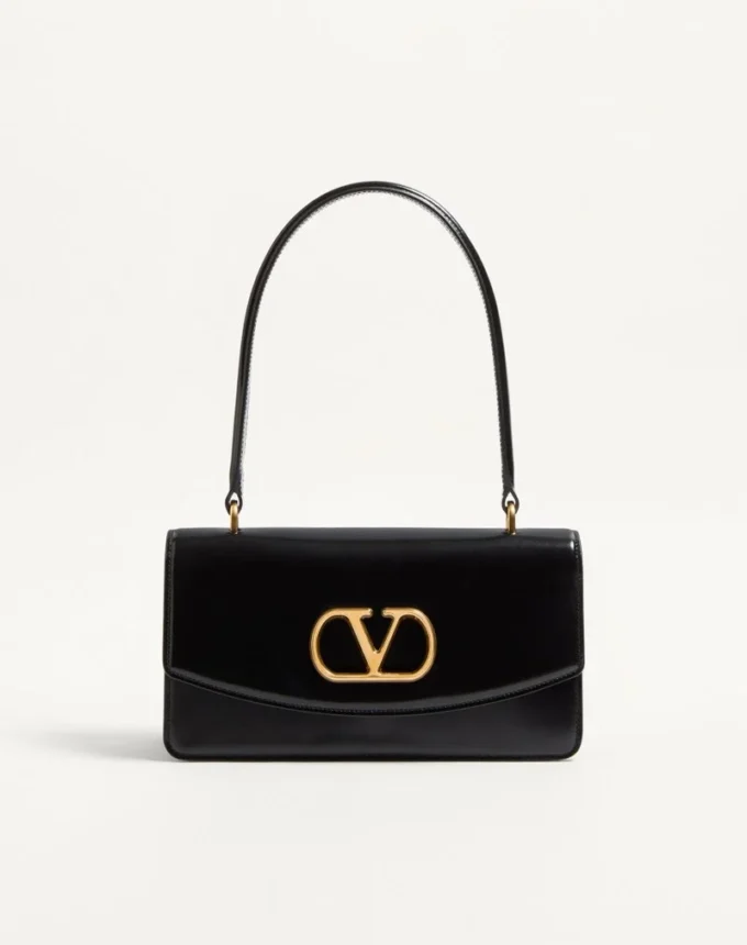 Bolso Valentino Garavani Vain con asa en piel de becerro brillante Bolso Valentino Garavani Vain con asa en piel de becerro brillante