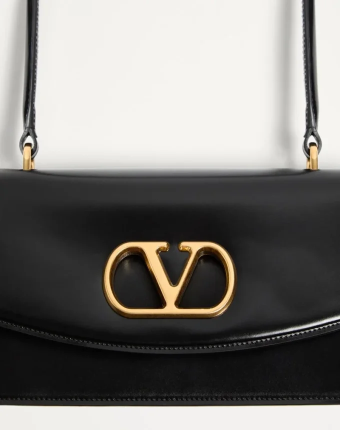 Bolso Valentino Garavani Vain con asa en piel de becerro brillante Bolso Valentino Garavani Vain con asa en piel de becerro brillante