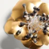 Broche Fleur Lumineuse de metal y tela