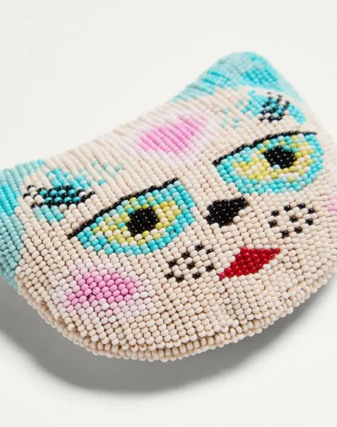 Broche Le Chat De La Maison en tejido jacquard con bordado de cuentas de resina