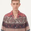 Camisa de bolos de muselina de algodón con estampado Voyage Imaginaire y ribetes de pasamanería Camisa de bolos de muselina de algodón con estampado Voyage Imaginaire y ribetes de pasamanería