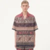Camisa de bolos de muselina de algodón con estampado Voyage Imaginaire y ribetes de pasamanería Camisa de bolos de muselina de algodón con estampado Voyage Imaginaire y ribetes de pasamanería