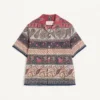 Camisa de bolos de muselina de algodón con estampado Voyage Imaginaire y ribetes de pasamanería Camisa de bolos de muselina de algodón con estampado Voyage Imaginaire y ribetes de pasamanería