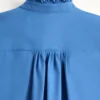 Camisa de popelín de algodón con plastrón y volantes Camisa de popelín de algodón con plastrón y volantes