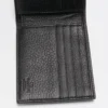Cartera Rockstud en piel de becerro granulada