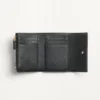 Cartera Rockstud Trifold en piel de becerro granulada Cartera Rockstud Trifold en piel de becerro granulada
