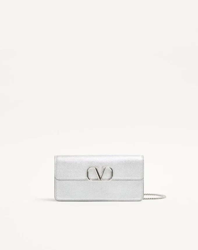Cartera Vlogo Signature de piel de becerro granulada metalizada con cadena