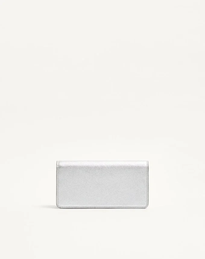 Cartera Vlogo Signature de piel de becerro granulada metalizada con cadena
