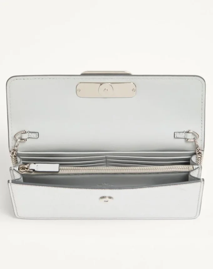 Cartera Vlogo Signature de piel de becerro granulada metalizada con cadena