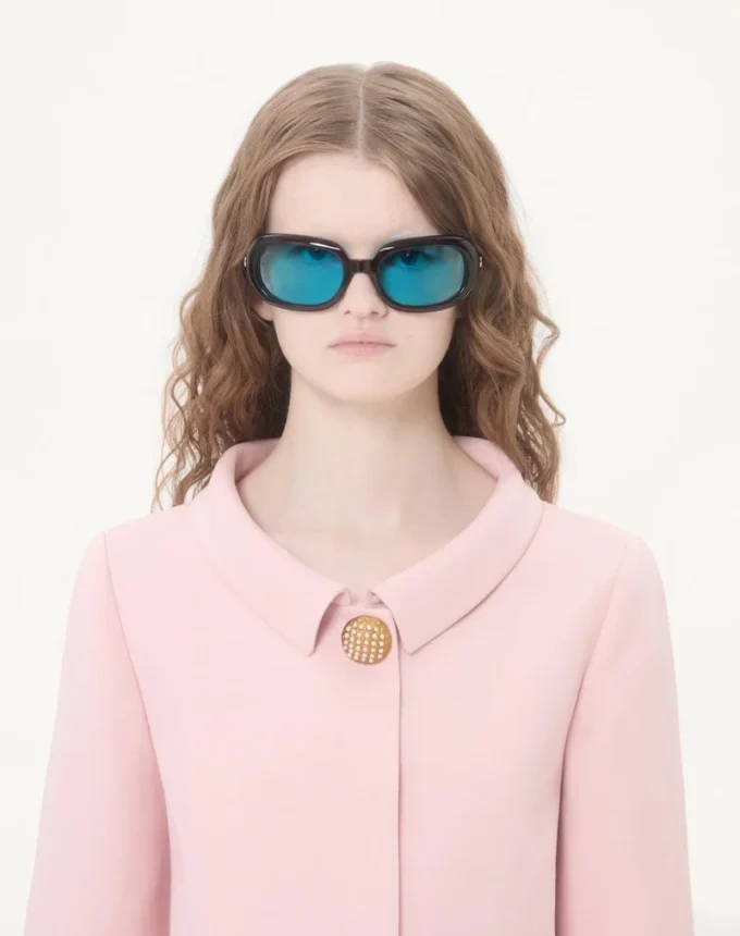 Chaqueta de crepé couture con plumas Chaqueta de crepé couture con plumas